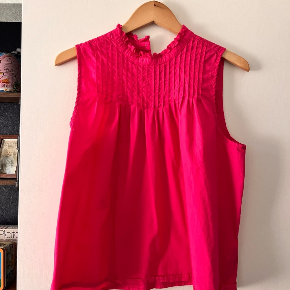Jcrew sleeveless hot pink blouse.